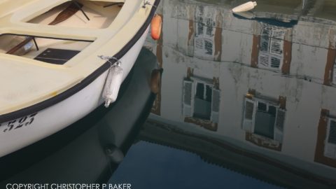 Reflections in Cres harbor on Croatia by Scooter tour with Edelweiss Bike Travel; copyright Christopher P Baker