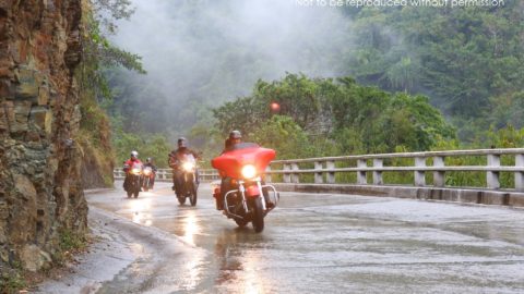 Motorcycle group head over La Farola, Barcoa, Cuba; copyright Christopher P Baker