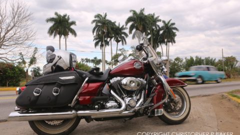 Harley-Davidson and 1950s classic car, Cuba; copyright Christopher P Baker